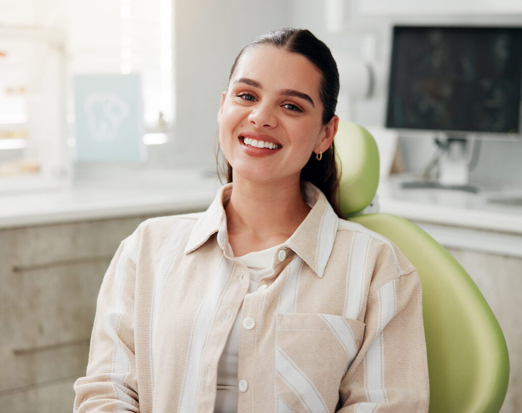 Woman, portrait and smile at dentist for oral hygiene, teeth whitening consultation or healthcare checkup. Dental care, medical and patient for cavity extraction, root canal examination and service.